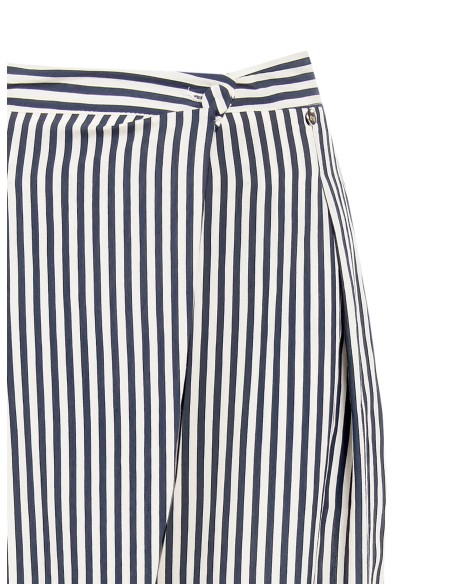 Pantalon palazzo rayé en mélange de lin et de viscose avec empiècement asymétrique Rinascimento