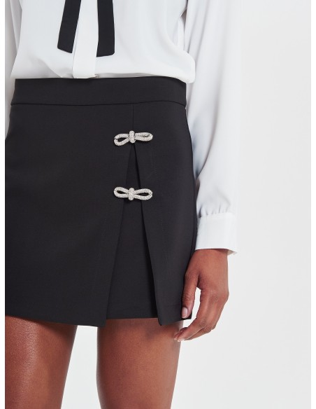 Jupe-short en tissu bistretch avec petits nœuds en strass Rinascimento