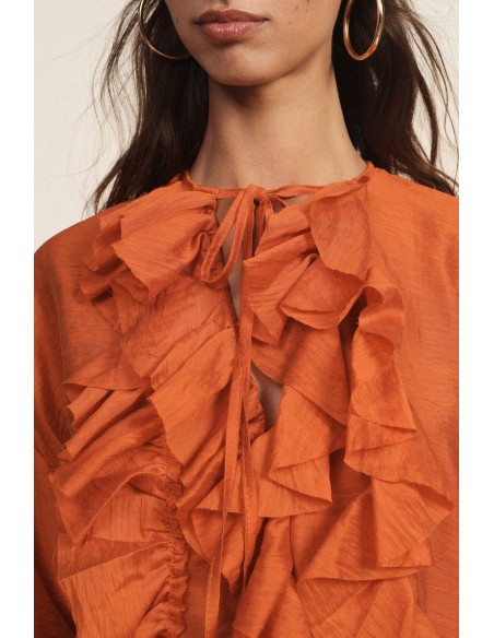 Blouse ample à manches longues et volants sur le devant Dixie