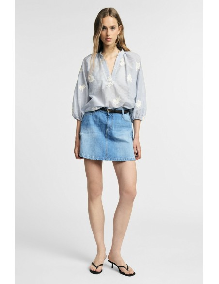 Jupe courte en denim effet usé à cinq poches Please