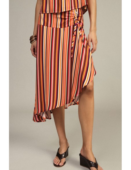 Jupe courte asymétrique à rayures avec nœud Dixie