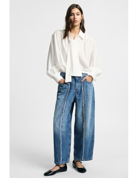 Jean à jambes larges avec coutures contrastantes Please