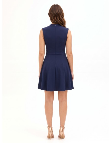 Robe courte évasée en tissu fluide avec décolleté en V croisé et détail métallique Rinascimento