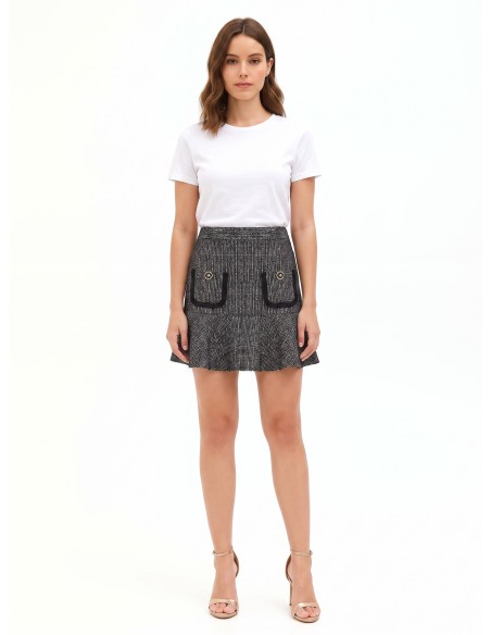 Mini-jupe en tweed avec bas volanté et petites poches effilochées Rinascimento