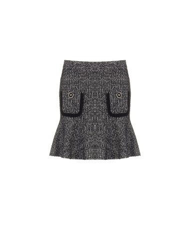 Mini-jupe en tweed avec bas volanté et petites poches effilochées Rinascimento