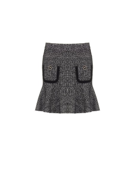 Mini-jupe en tweed avec bas volanté et petites poches effilochées Rinascimento