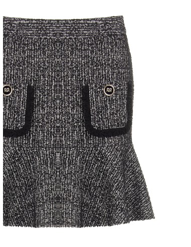 Mini-jupe en tweed avec bas volanté et petites poches effilochées Rinascimento