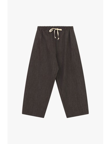 Pantalon palazzo à taille élastiquée et cordon de serrage.