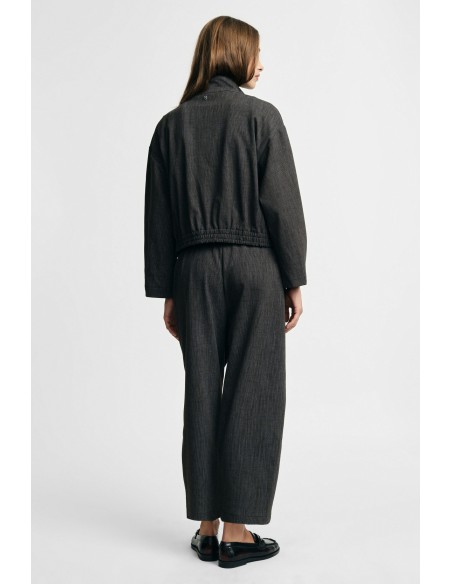 Pantalon palazzo à taille élastiquée et cordon de serrage.