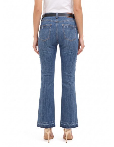 Jean flare extensible avec clous et ourlet effiloché Rinascimento