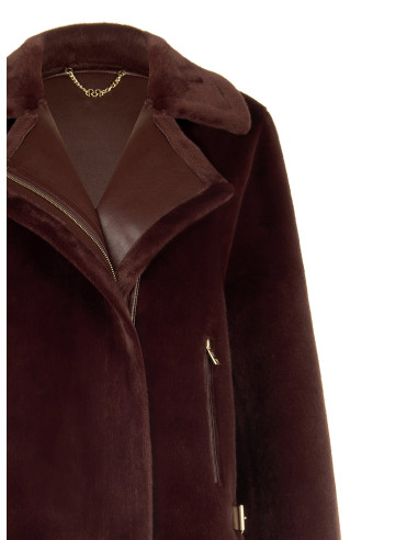 Veste courte en fausse fourrure avec détails en similicuir et poches avant zippées dorées Rinascimento