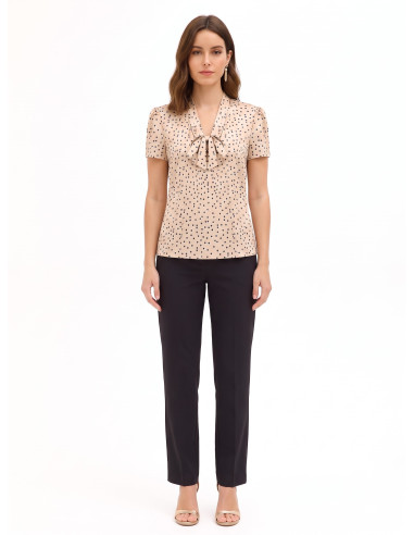 Blouse en satin à pois doubles avec col en V et nœud Rinascimento