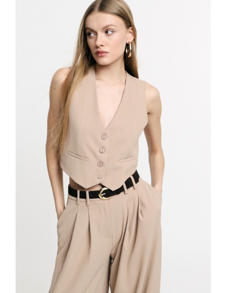 Gilet court avec boutons et poches sur le devant Please