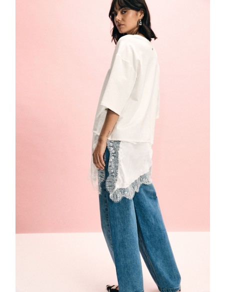 Asymmetrische top met contrasterende kanten boord alstublieft