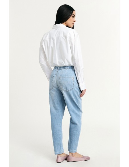 Balloon-fitjeans met sleutelhanger in de vorm van een beertje, alstublieft